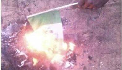 “Northerners Are Feeding On Leaves” – Northern Youths Burn Nigerian Flag As They Lament Over Hardship