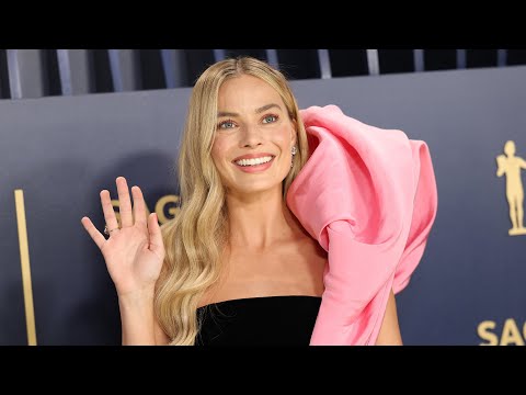 Margot Robbie Dazzles in BARBIE-Inspired Pink and Black Gown at SAG Awards